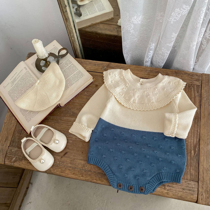 【73-90】ラッフルカラーニットロンパース