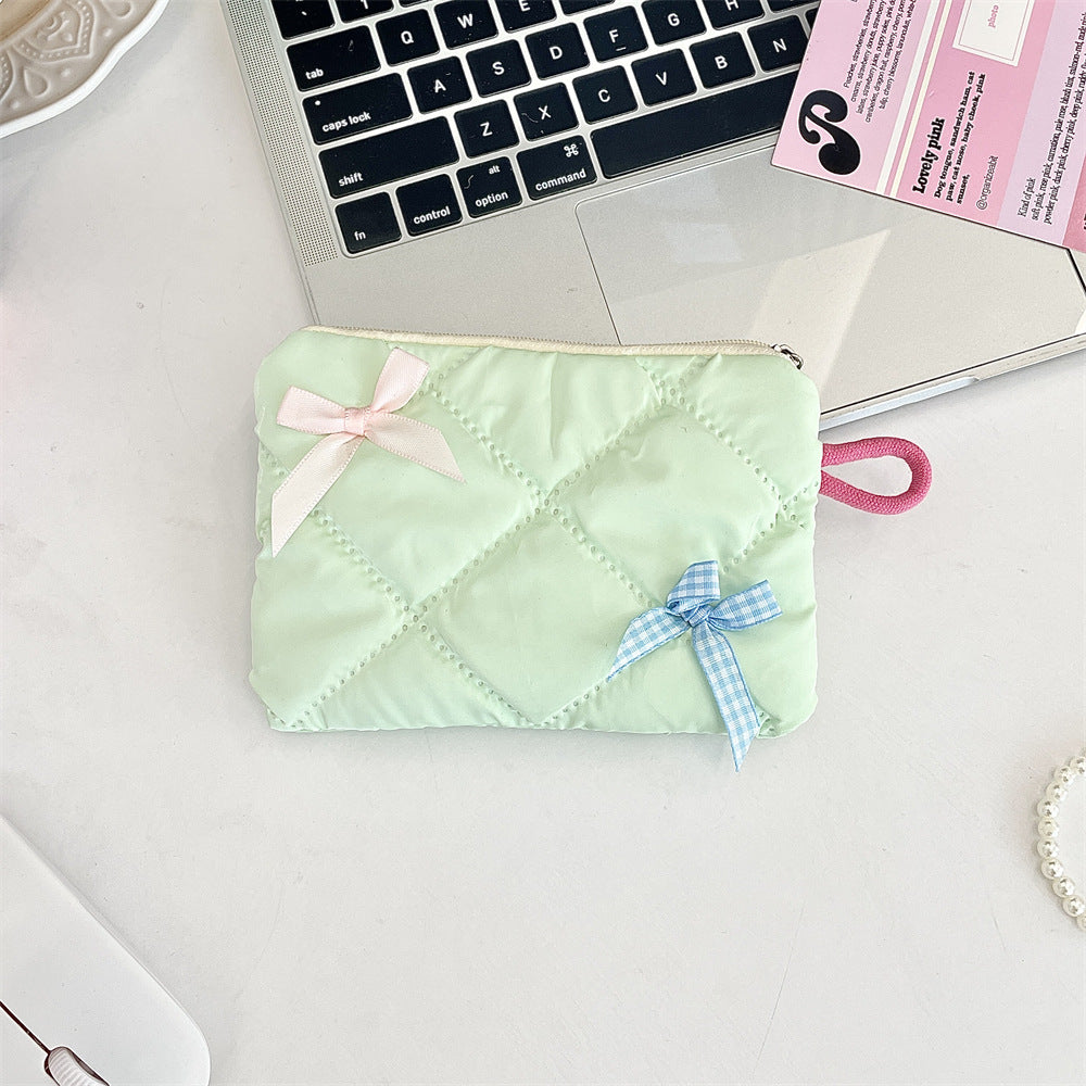 リボンモチーフキルティングポーチ