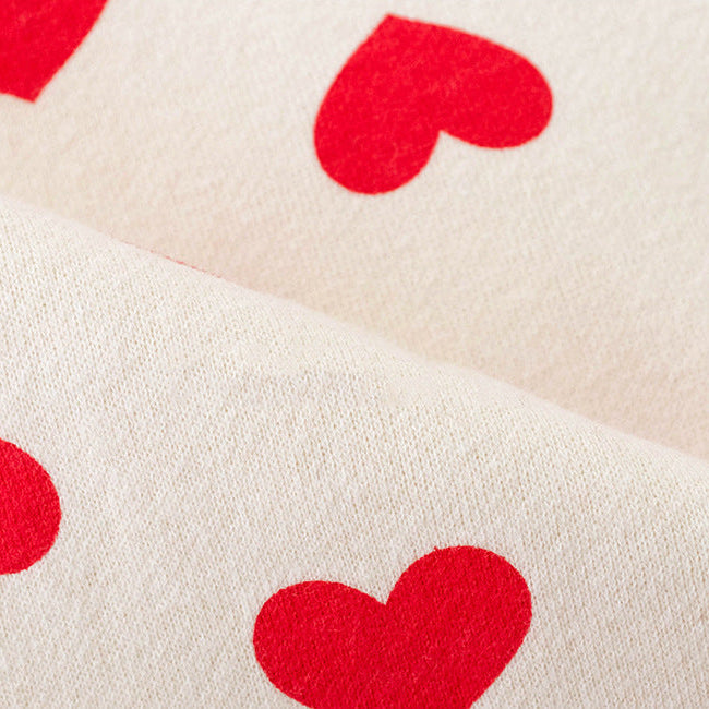 【73-90】帽子付きサンタモチーフ長袖ロンパース