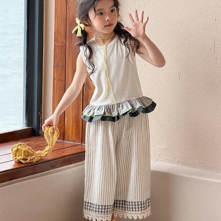 【90-150】バイカラーフリルヘムノースリーブトップス