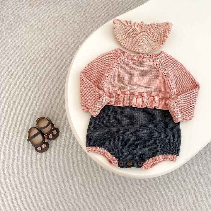 【73-90】バイカラーウエストフリルニットロンパース