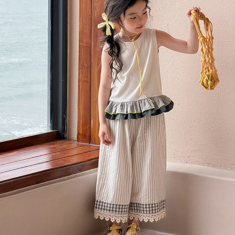 【90-150】バイカラーフリルヘムノースリーブトップス