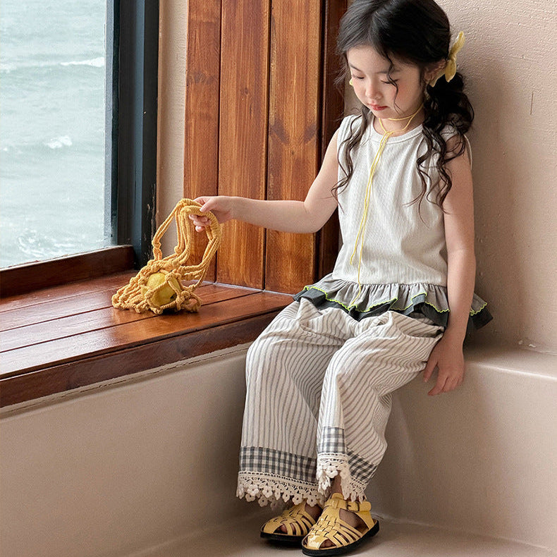 【90-150】バイカラーフリルヘムノースリーブトップス