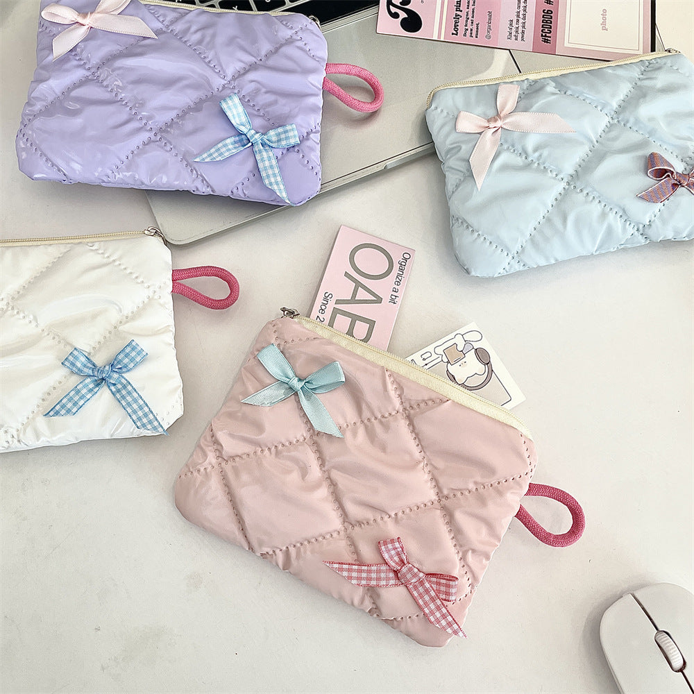 リボンモチーフキルティングポーチ