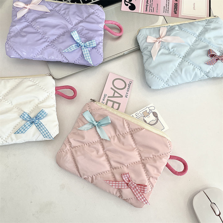 リボンモチーフキルティングポーチ