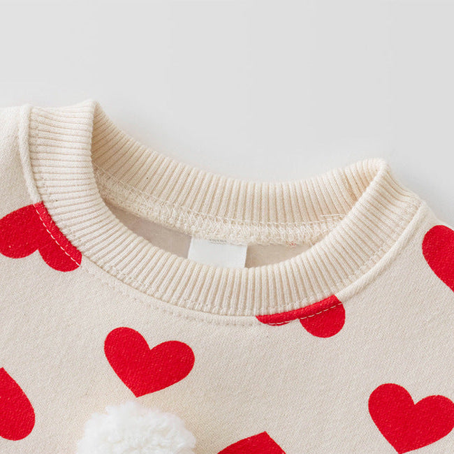 【73-90】帽子付きサンタモチーフ長袖ロンパース