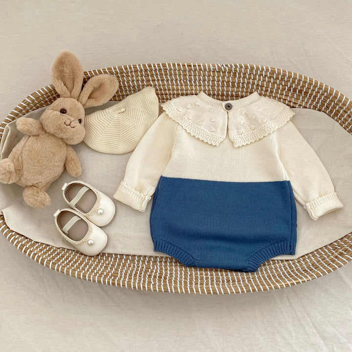 【73-90】ラッフルカラーニットロンパース