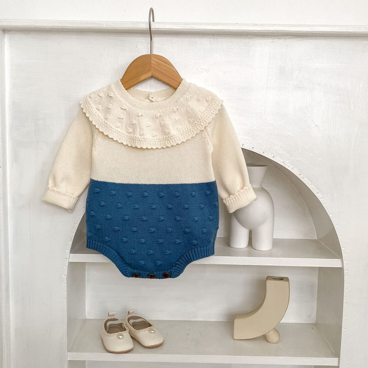 【73-90】ラッフルカラーニットロンパース