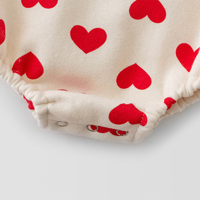 【73-90】帽子付きサンタモチーフ長袖ロンパース