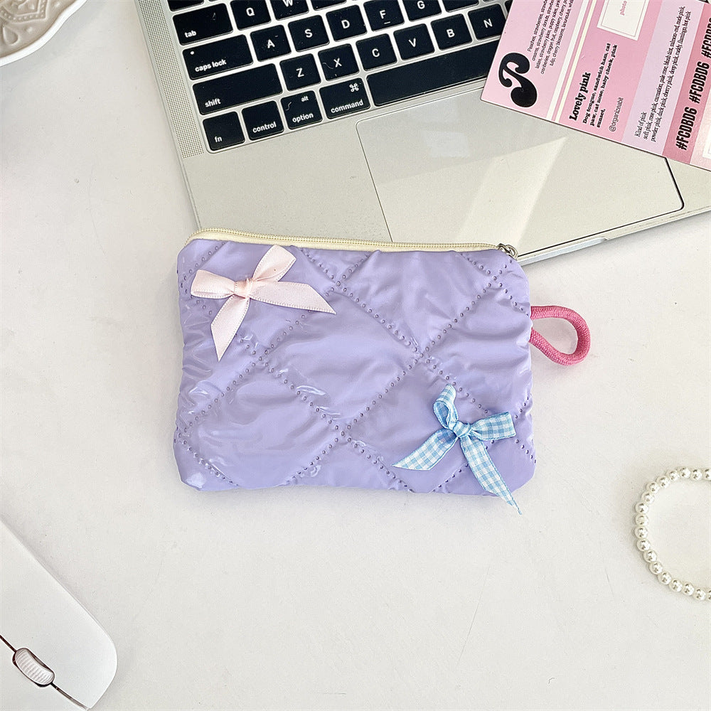 リボンモチーフキルティングポーチ