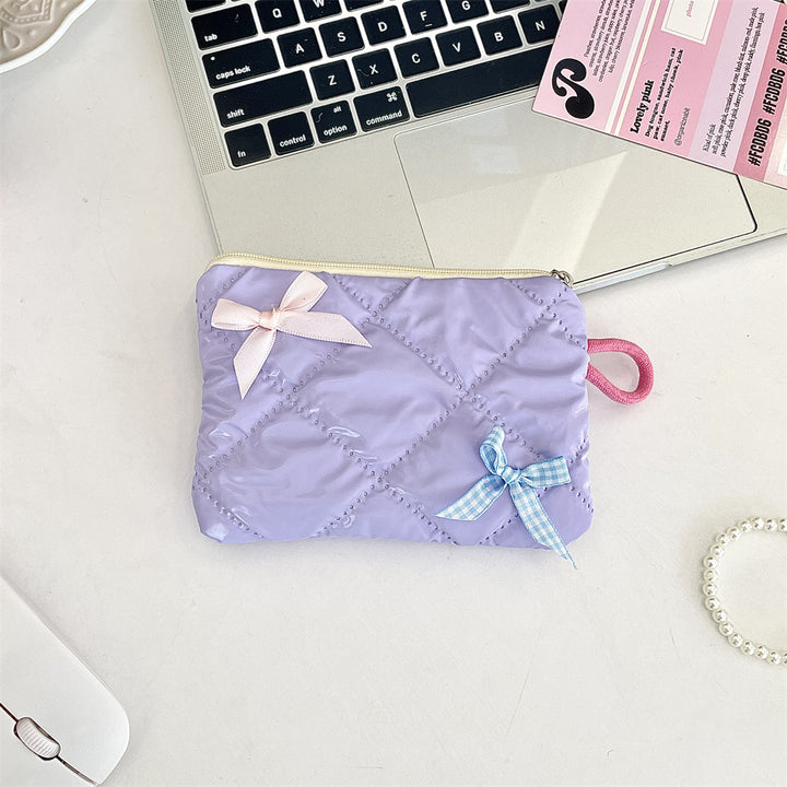 リボンモチーフキルティングポーチ