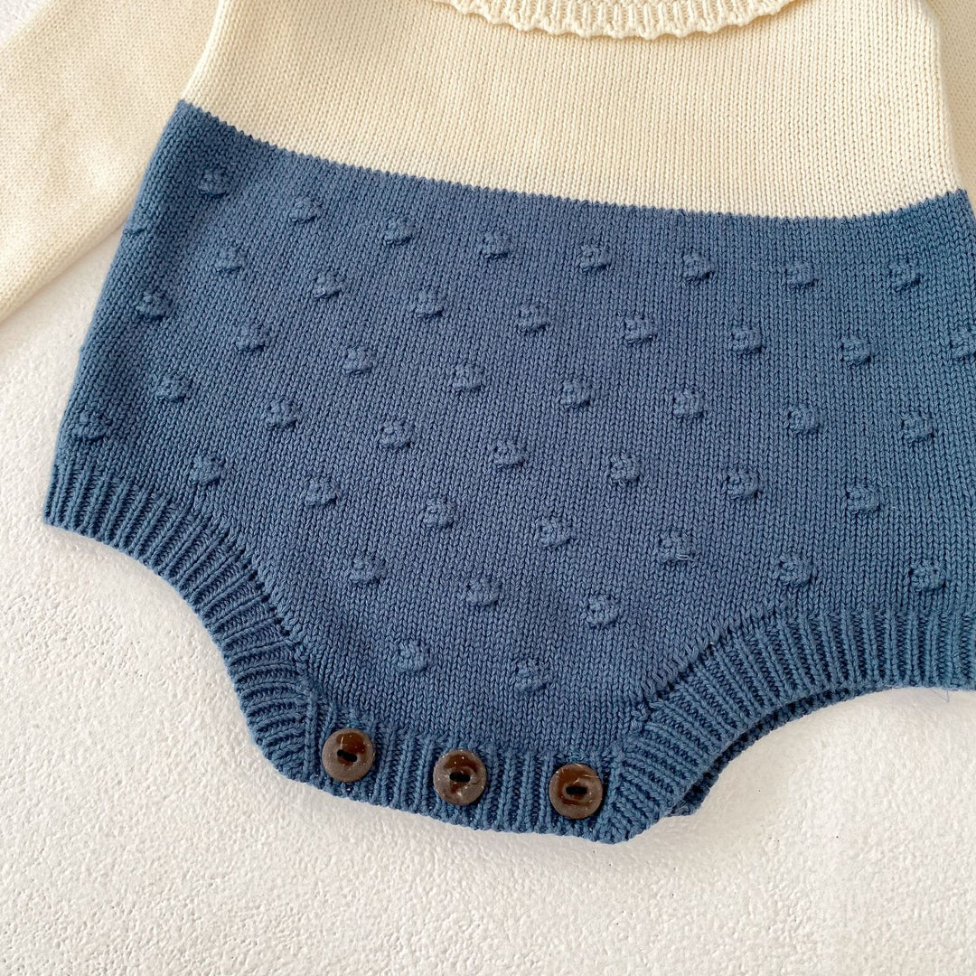 【73-90】ラッフルカラーニットロンパース