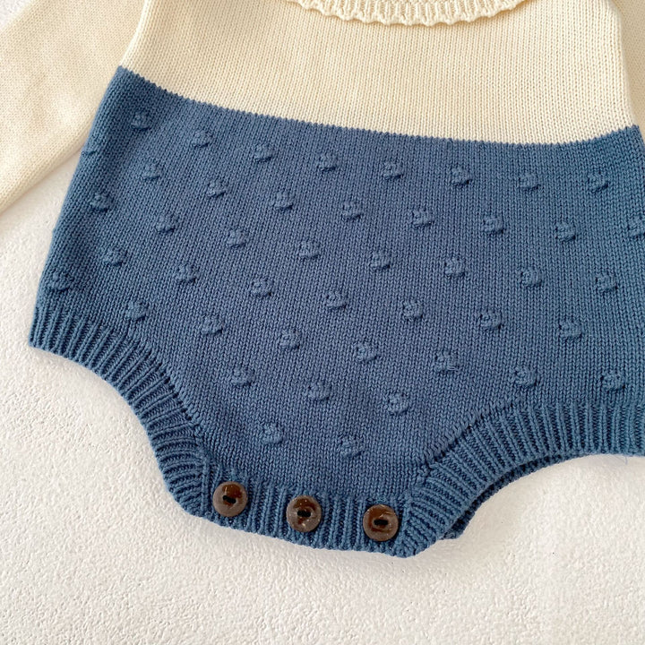 【73-90】ラッフルカラーニットロンパース