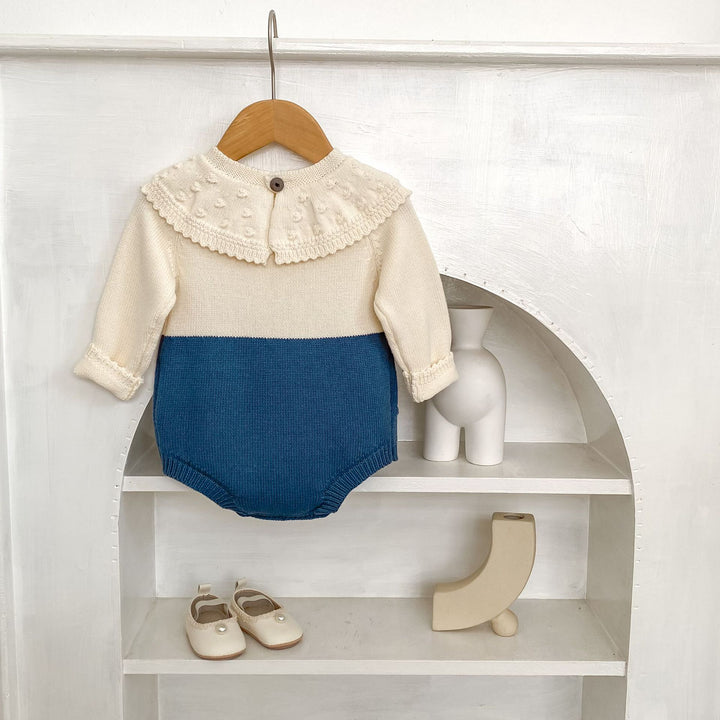 【73-90】ラッフルカラーニットロンパース