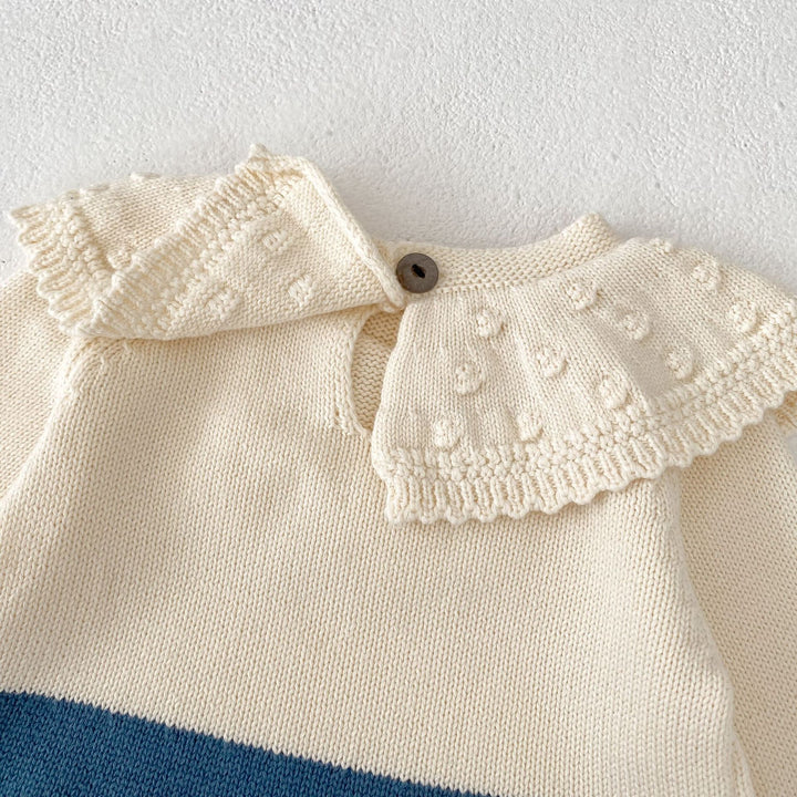 【73-90】ラッフルカラーニットロンパース