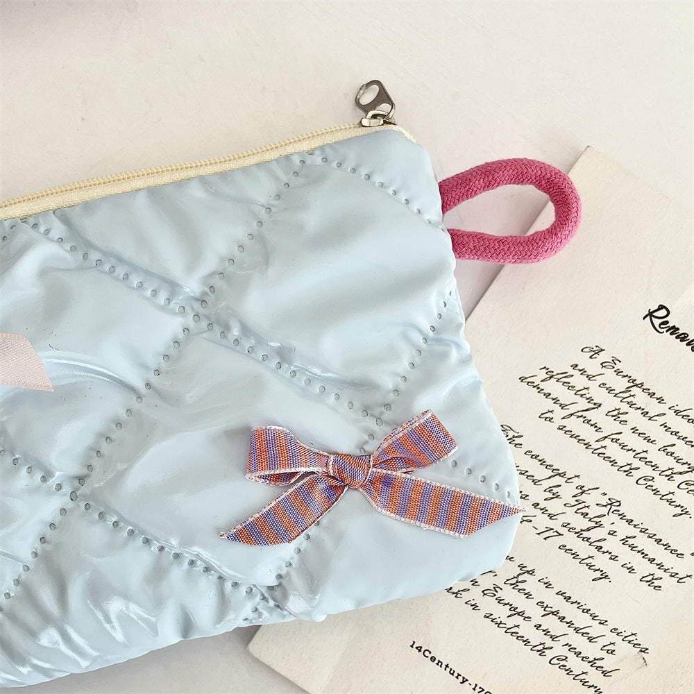 リボンモチーフキルティングポーチ