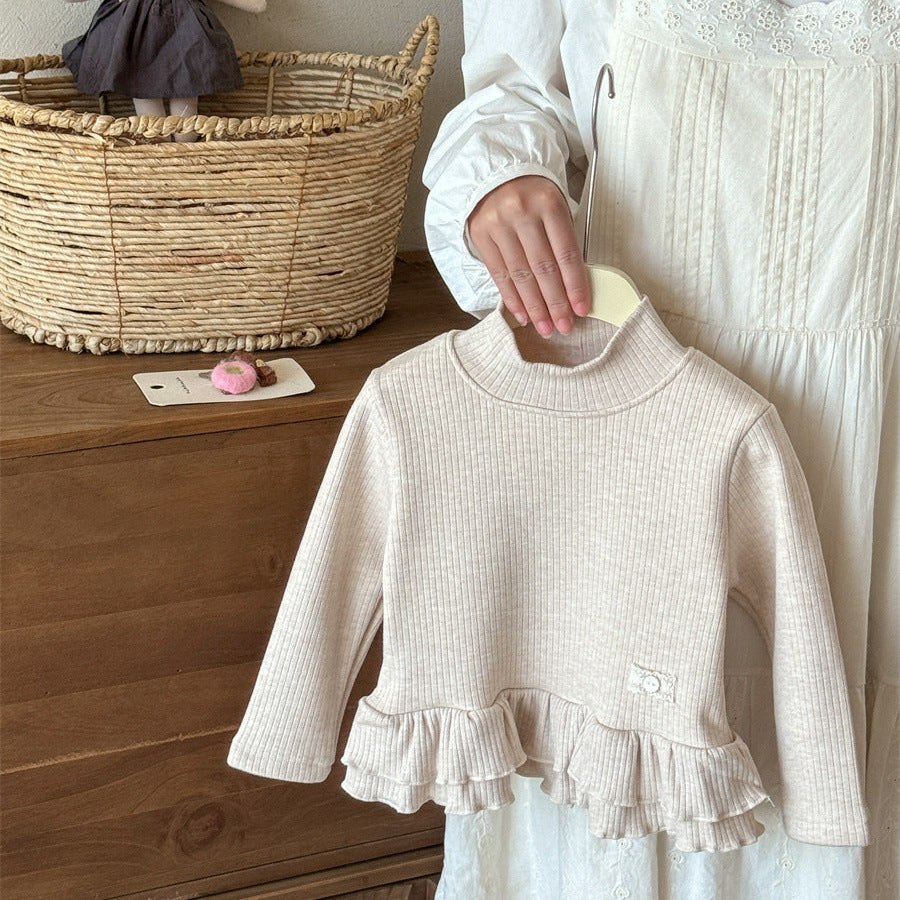 【90-140】ハイネックティアードヘムトップス