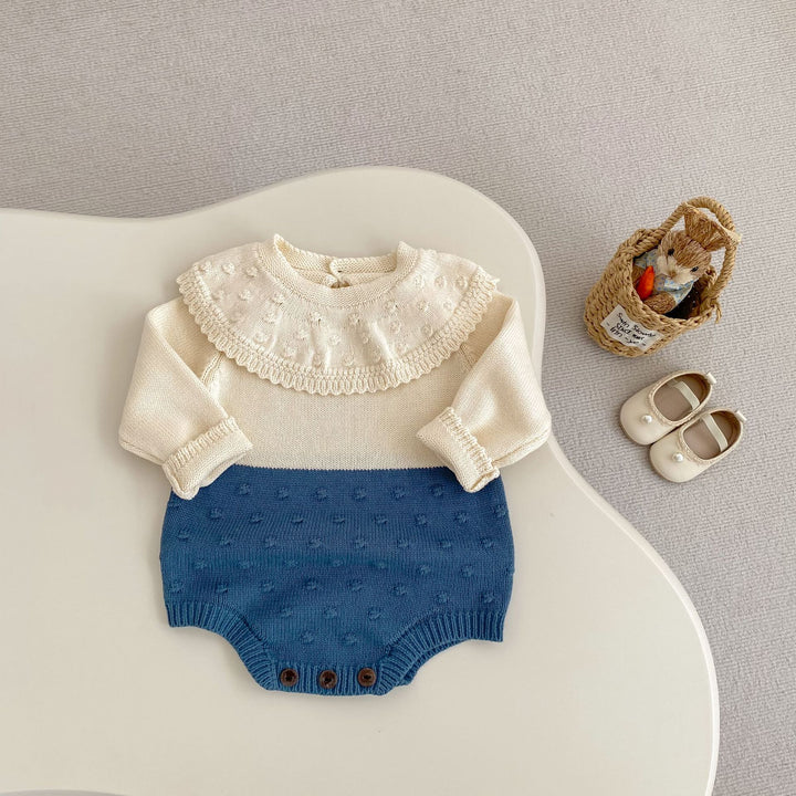 【73-90】ラッフルカラーニットロンパース