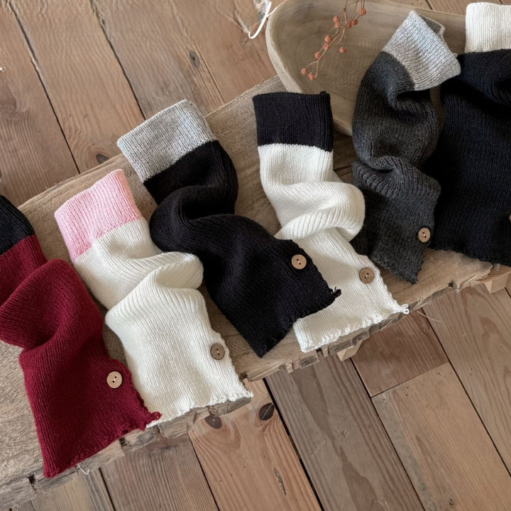 裾ボタンバイカラーレッグウォーマー