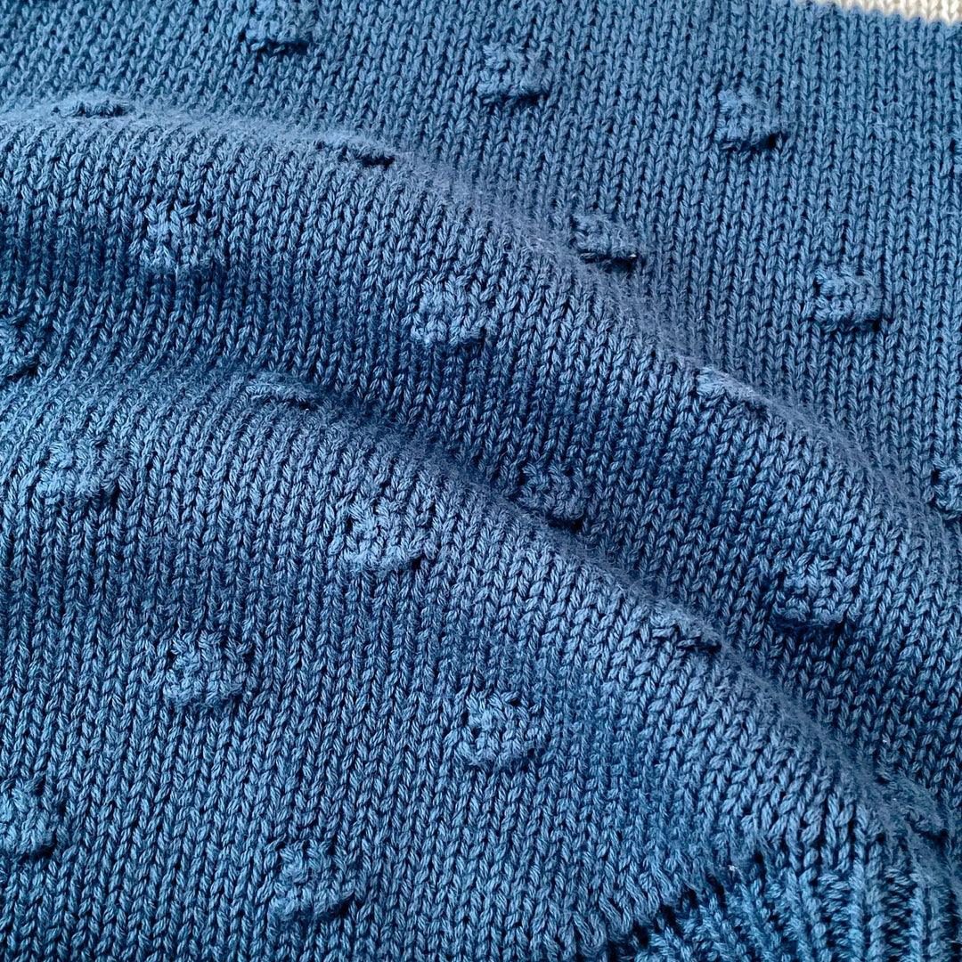 【73-90】ラッフルカラーニットロンパース