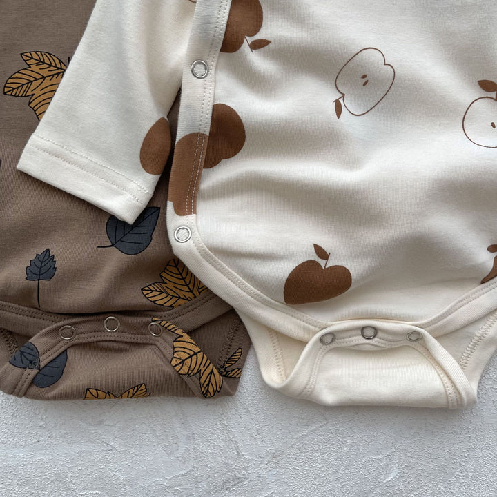 【baby】プリント長袖クロスオーバーロンパース