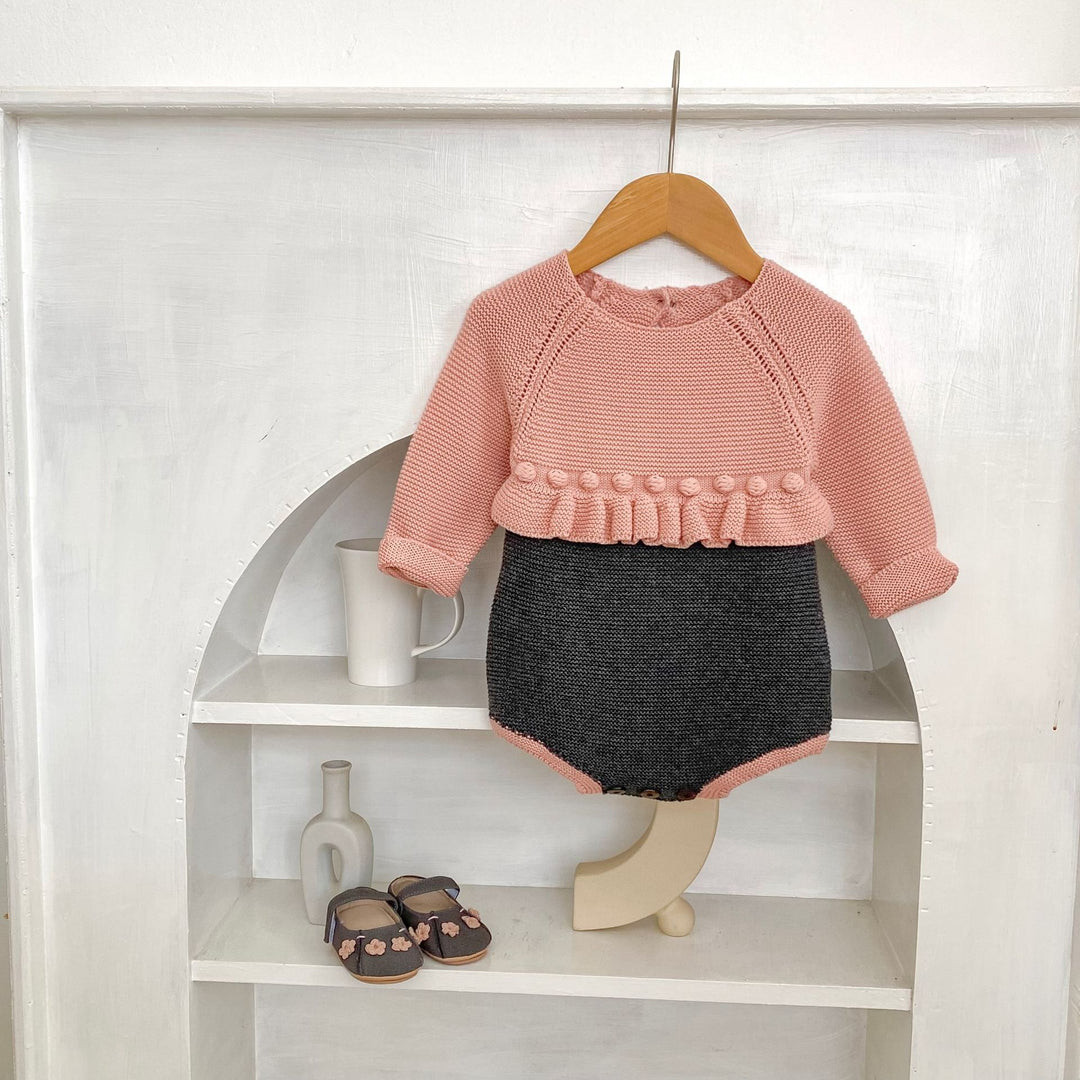 【73-90】バイカラーウエストフリルニットロンパース