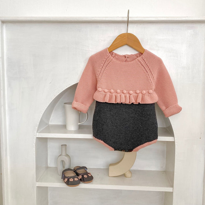 【73-90】バイカラーウエストフリルニットロンパース