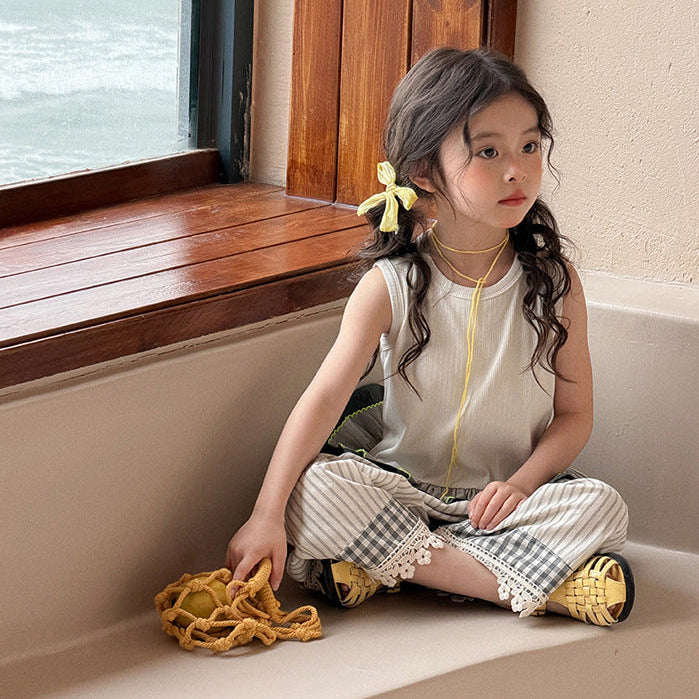 【90-150】バイカラーフリルヘムノースリーブトップス