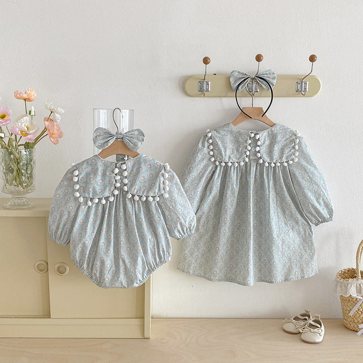 【73-90】ミニポンポンデザイン長袖ロンパース