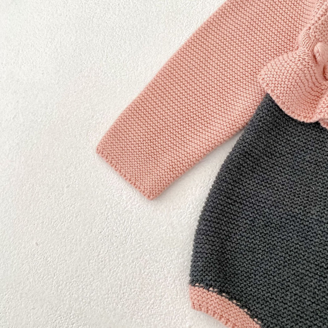 【73-90】バイカラーウエストフリルニットロンパース