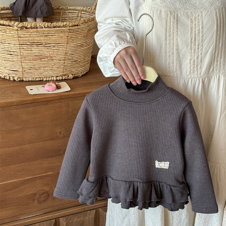 【90-140】ハイネックティアードヘムトップス