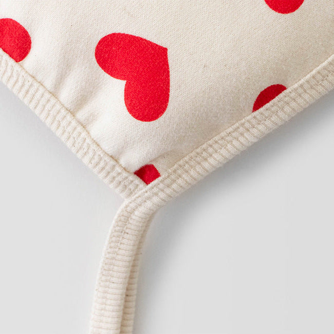 【73-90】帽子付きサンタモチーフ長袖ロンパース