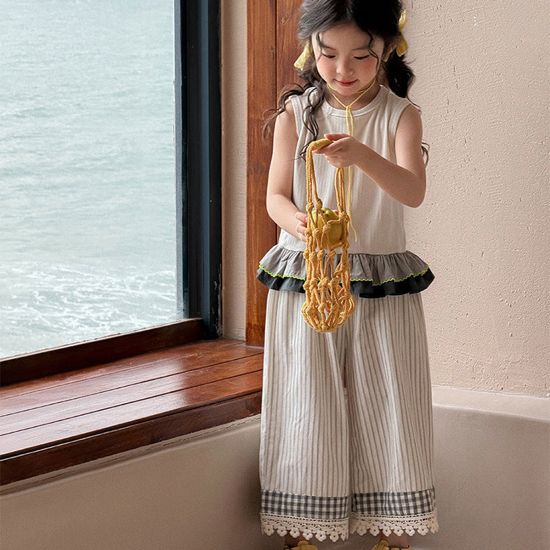 【90-150】バイカラーフリルヘムノースリーブトップス