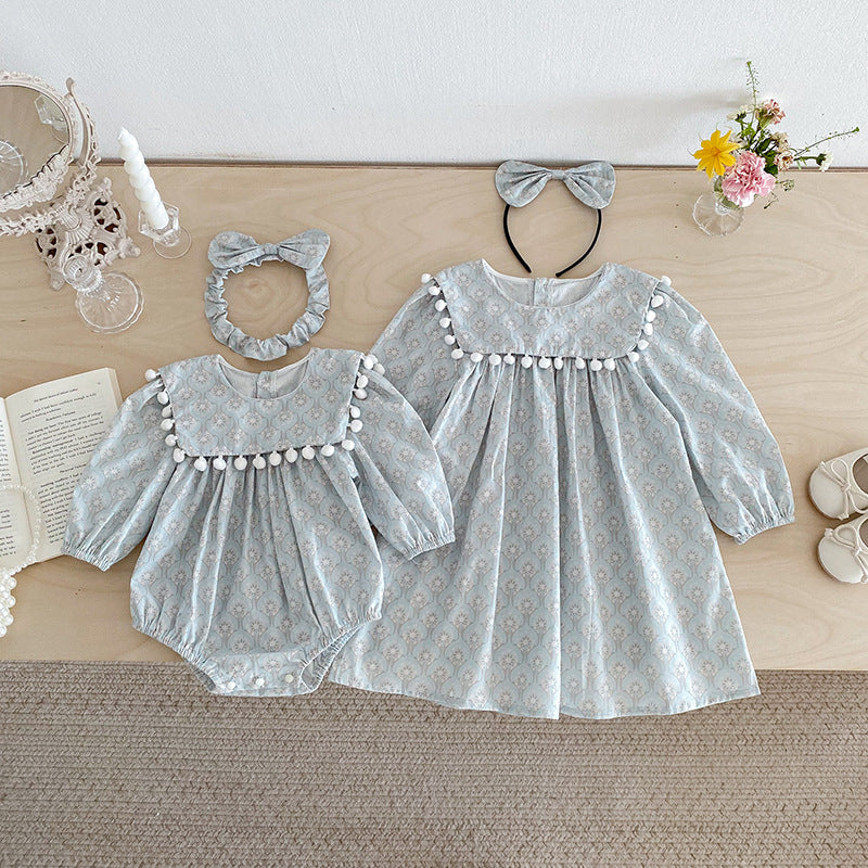 【73-90】ミニポンポンデザイン長袖ロンパース