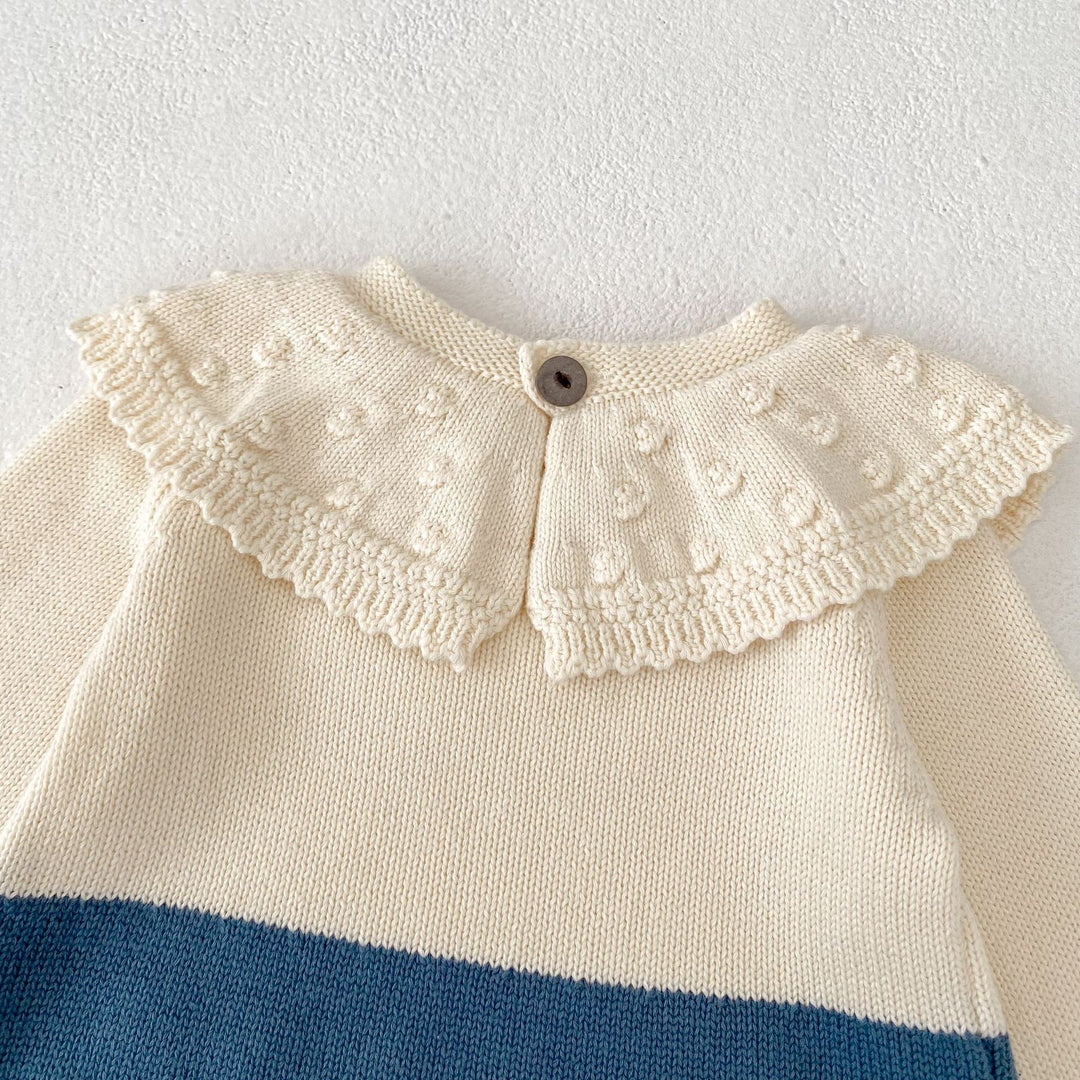 【73-90】ラッフルカラーニットロンパース