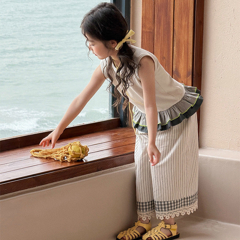 【90-150】バイカラーフリルヘムノースリーブトップス